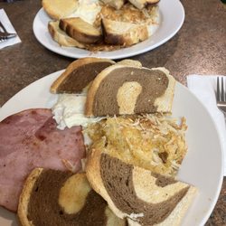 Maryann's Countrytime Cafe - Eggs hash browns and ham steak. $5.99 and $9.99 (.30 more to sub HB for home fries).
