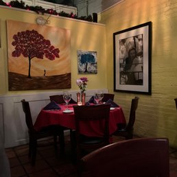 a woman sitting at a table a woman sitting at a table