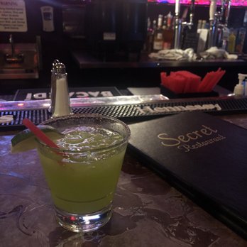 Secret Bar & Grill - Pictured is the bar area, and my favorite $5 Melon Margarita! (comes with tajin and salt on the rim) yum! - Sports Bars Near Me - Los Angeles, California Secret Bar & Grill - Pictured is the bar area, and my favorite $5 Melon Margarita! (comes with tajin and salt on the rim) yum! - Sports Bars Near Me - Los Angeles, California