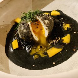 Le Coin - Soft-boiled egg with mango and fennel with a coconut black curry .  It was super special.