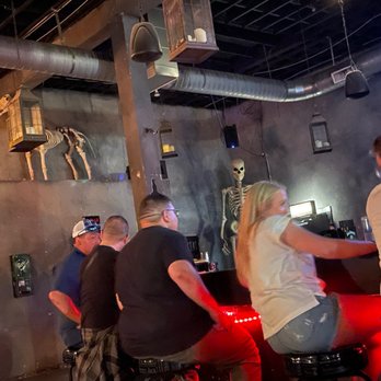 Dirt Bar - Bar area and some of the skeletons - Dive Bars Near Me - Houston, Texas Dirt Bar - Bar area and some of the skeletons - Dive Bars Near Me - Houston, Texas