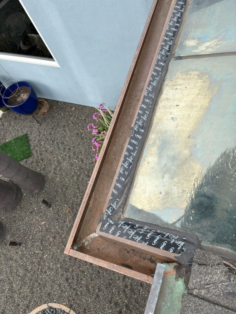 Slide of Vigil's Roofing