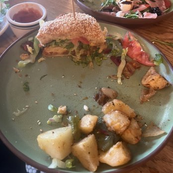 Jackdaw - Half of my Buffalo Chicken Sandwich with home fries. Wasn't the best - Cocktail Bars Near Me - New York, New York