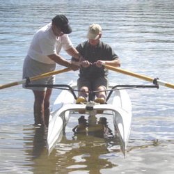 Adirondack Rowing - Pete teaching a novice rower at our rowing school.