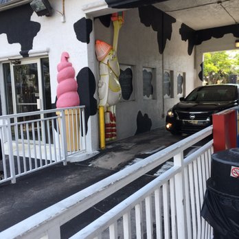 Moo's Soft Serve - There's a drive thru!!! But it is kinda fun to sit at those benches and enjoy the ice cream. - Ice Cream & Frozen Yogurt Near Me - Indialantic, Florida