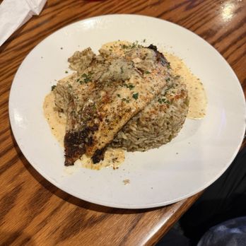 Stripes Pub & Grill - Redfish and dirty rice. - American Near Me - Navarre, Florida Stripes Pub & Grill - Redfish and dirty rice. - American Near Me - Navarre, Florida