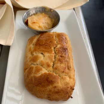 Lido - Biscuit with chipotle honey butter - Italian Near Me - New York, New York Lido - Biscuit with chipotle honey butter - Italian Near Me - New York, New York