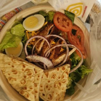 Showmars - University - Grilled chicken salad with onions, eggs, tomatoes and pita - Greek Near Me - Charlotte, North Carolina Showmars - University - Grilled chicken salad with onions, eggs, tomatoes and pita - Greek Near Me - Charlotte, North Carolina