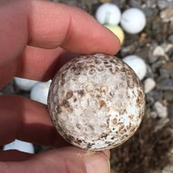 Jd's Golf Driving Range - Balls and mats. Those balls are all cracked and came from one bucket.