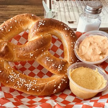 Biergarten - Brezel with mustard and obatzda cheese spread. PERFECTION! - Wine Bars Near Me - Tucson, Arizona Biergarten - Brezel with mustard and obatzda cheese spread. PERFECTION! - Wine Bars Near Me - Tucson, Arizona