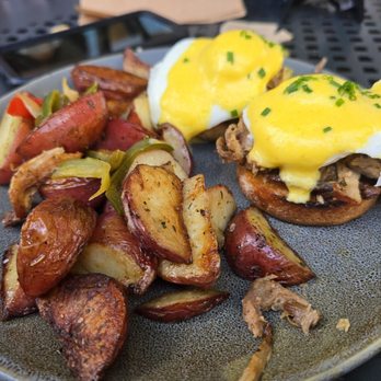 The Crema Cafe - Half of Carnitas Benedict, half of Persian Benedict - Bakeries Near Me - Seal Beach, California