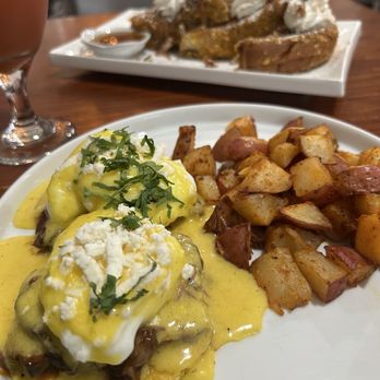 Valentinas Kitchen - The Braised Short Ribs Eggs Benedict with the Pumpkin Stuffed French Toast in the background. The perfect breakfast! - Breakfast & Brunch Near Me - American Canyon, California Valentinas Kitchen - The Braised Short Ribs Eggs Benedict with the Pumpkin Stuffed French Toast in the background. The perfect breakfast! - Breakfast & Brunch Near Me - American Canyon, California
