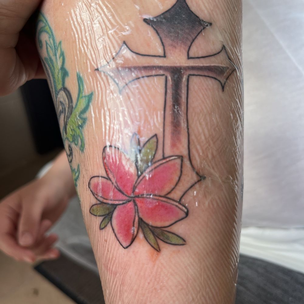 Sweet Trade Tattoo - Cross and plumeria - Tattoo Near Me - Lahaina, Hawaii Sweet Trade Tattoo - Cross and plumeria - Tattoo Near Me - Lahaina, Hawaii