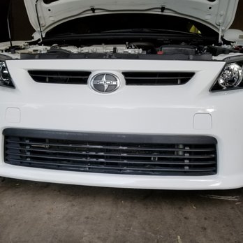 Dan The Bumper Man - After: repaired and painted dent, scratches, and license plate holes. - Body Shops Near Me