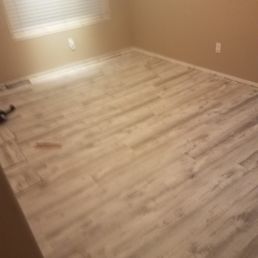 New Vinyl Flooring installed to replace damaged wood flooring New Vinyl Flooring installed to replace damaged wood flooring