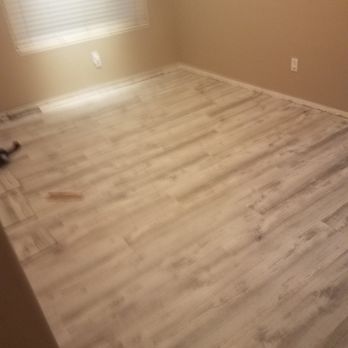 Sav On Home Improvement - New Vinyl Flooring installed to replace damaged wood flooring - Carpet Cleaning Near Me - Chandler, Arizona Sav On Home Improvement - New Vinyl Flooring installed to replace damaged wood flooring - Carpet Cleaning Near Me - Chandler, Arizona