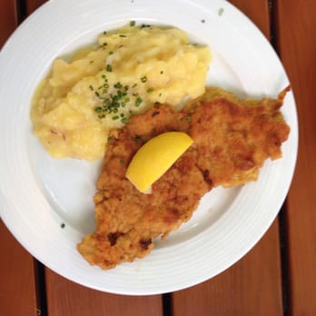 Augustiner-Keller - Pork schnitzel (thin and fried in a light horseradish batter) with potatoes. - Bavarian Near Me - Munich, BY