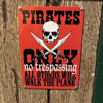 Pirates Cove - a pirate's only no trespassing sign - American Near Me - Delavan, Wisconsin