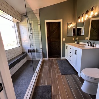Advanced Custom Renovations - a bathroom with a walk in shower - Flooring Near Me - Chandler, Arizona