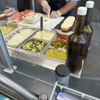 Jersey Mike's Subs - Employee attempted to cut everything with the board scraper, not even a proper cutting tool. Disgusting. - Sandwiches Near Me - Indio, California Jersey Mike's Subs - Employee attempted to cut everything with the board scraper, not even a proper cutting tool. Disgusting. - Sandwiches Near Me - Indio, California