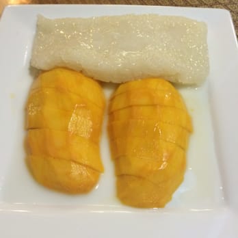 Thai Basil Restaurant - Sweet rice and mango. Mouth watering!! It's a dessert but I ate it as my main entree! Hehe - Thai Near Me - Visalia, California