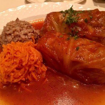 Russian Tea Time - Classic Stuffed Cabbage Golubtsi. I didn't care much for the sides of buckwheat kasha and carrots so all my attention went to the rolls. - Russian Near Me - Chicago, Illinois Russian Tea Time - Classic Stuffed Cabbage Golubtsi. I didn't care much for the sides of buckwheat kasha and carrots so all my attention went to the rolls. - Russian Near Me - Chicago, Illinois