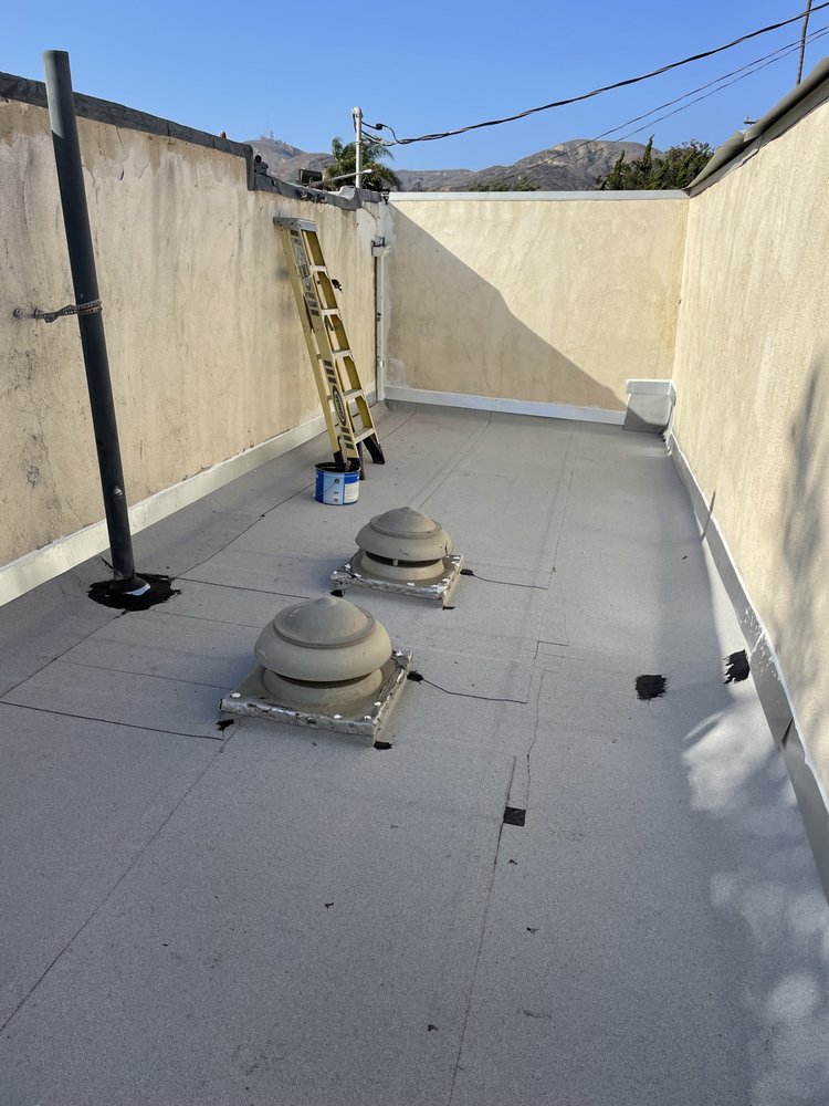 Slide of El Puma Roofing