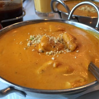 Amber Indian Restaurant - Chicken korma! This dish comes out piping hot and has a wonderful creamery tomato based sauce. Chicken is tender and juicy - Indian Near Me - Carmel, Indiana