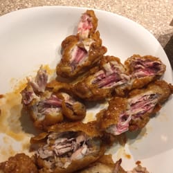 Pizza Hut - National wing day? More like salmonella symptoms day. A whole order of uncooked wings.