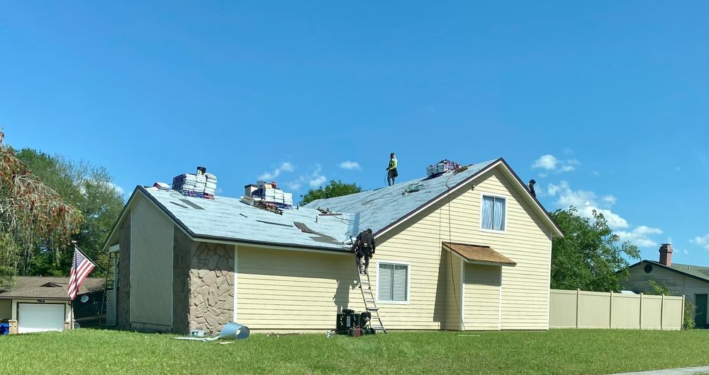 Slide of J&M Roofing Services