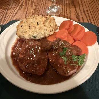 Huntergreen Inn & Pub - Pork chops with Marsala sauce, twice baked potato, carrots - American Near Me - Raymond, Illinois Huntergreen Inn & Pub - Pork chops with Marsala sauce, twice baked potato, carrots - American Near Me - Raymond, Illinois