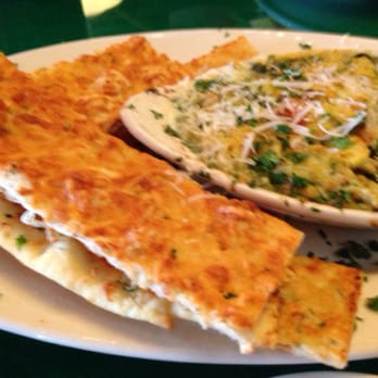 Oregano's - Boom dip! Who loves artichoke dip? We do! - Pizza Near Me - Cave Creek, Arizona Oregano's - Boom dip! Who loves artichoke dip? We do! - Pizza Near Me - Cave Creek, Arizona
