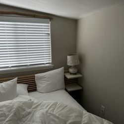 Cottages On River Road - Lower ceiling above bed and 10 inches from the wall to the bed!