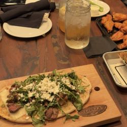 Teller's Taproom & Kitchen - Steak chimichurri flatbread, wings and poke tacos