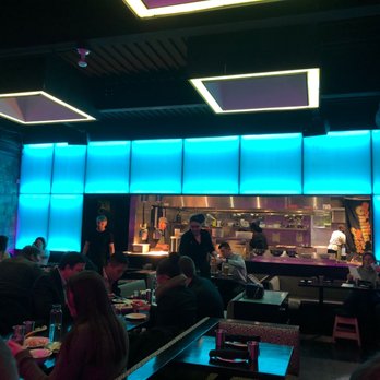 Takoi - Small tables and chairs - Thai Near Me - Detroit, Michigan