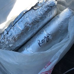Las Espuelas Inc - 2 Asada burritos with everything one with red salsa the other green salsa