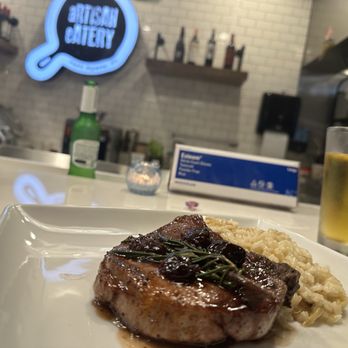 Artisan Eatery - Pork chop dinner special with rissotto - New American Near Me - Fort Myers, Florida Artisan Eatery - Pork chop dinner special with rissotto - New American Near Me - Fort Myers, Florida