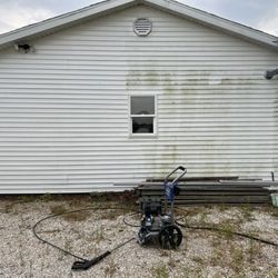 Nicks Handyman Services - Pressure washed this building.  Before on the right and after on the left.