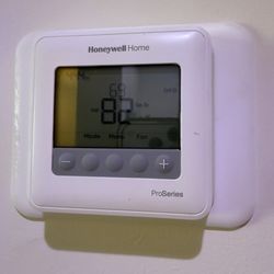 Airtron Heating & Air Conditioning  - Thermostat reading 82°