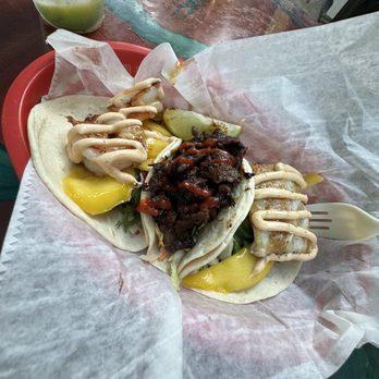 Taco trio: Korean BBQ Cayo fish  Yum yum shrimp