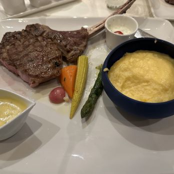 Restaurant Balances - Bone in Chop with Cheese Polenta. - Bars Near Me - Luzern, LU Restaurant Balances - Bone in Chop with Cheese Polenta. - Bars Near Me - Luzern, LU