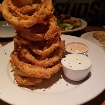 Cheddar's Scratch Kitchen - Onion rings with house made ranch and chipotle dipping sauces - Comfort Food Near Me - Chandler, Arizona Cheddar's Scratch Kitchen - Onion rings with house made ranch and chipotle dipping sauces - Comfort Food Near Me - Chandler, Arizona