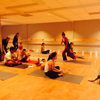 Sweat + Soul - Studio getting ready for candlelight Yin yoga class - Barre Classes Near Me - Honolulu, Hawaii