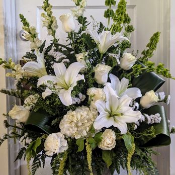 Seatac Buds & Blooms - White lilies, roses, hydrangea, bells of ireland - Florists Near Me - SeaTac, Washington Seatac Buds & Blooms - White lilies, roses, hydrangea, bells of ireland - Florists Near Me - SeaTac, Washington
