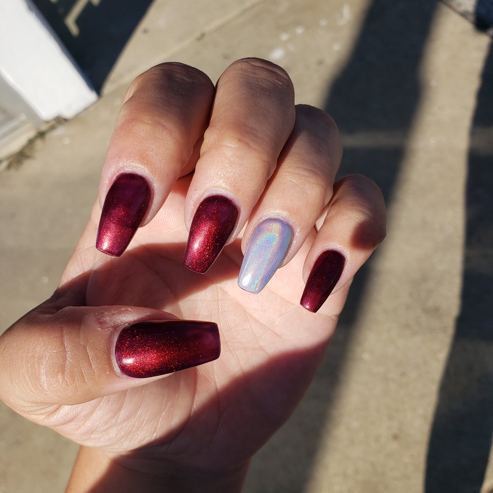 Nail color is Gelish "my forbidden love" and the ring fingers are Holo