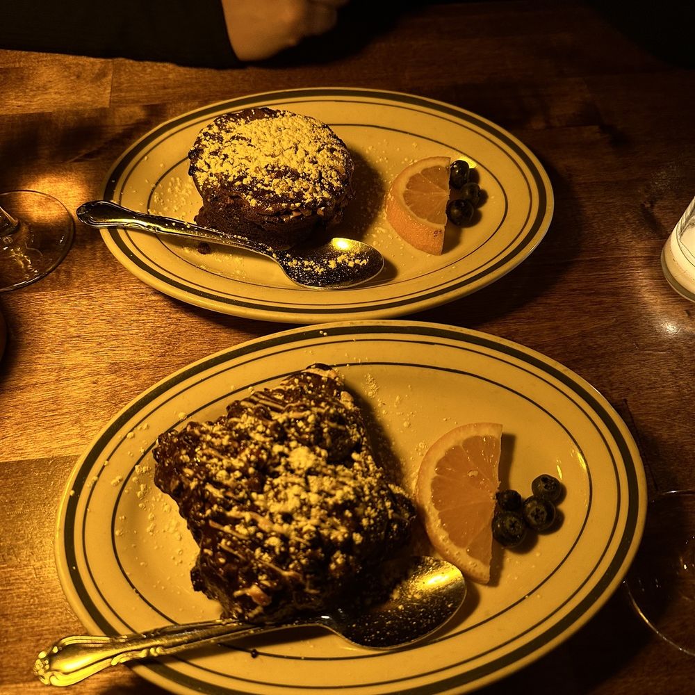 WILD - two plates of dessert on a wooden table - New American Near Me - New York, New York WILD - two plates of dessert on a wooden table - New American Near Me - New York, New York