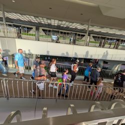 Epcot Monorail - Leaving the Monorail Green train from the Transportation and Ticket Center (TTC) and headed down the ramps to enter EPCOT at Disney World.