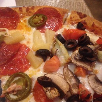Hideaway Pizza - The pizza. Thin crust, red sauce, create your own. - Pizza Near Me - Oklahoma City, Oklahoma