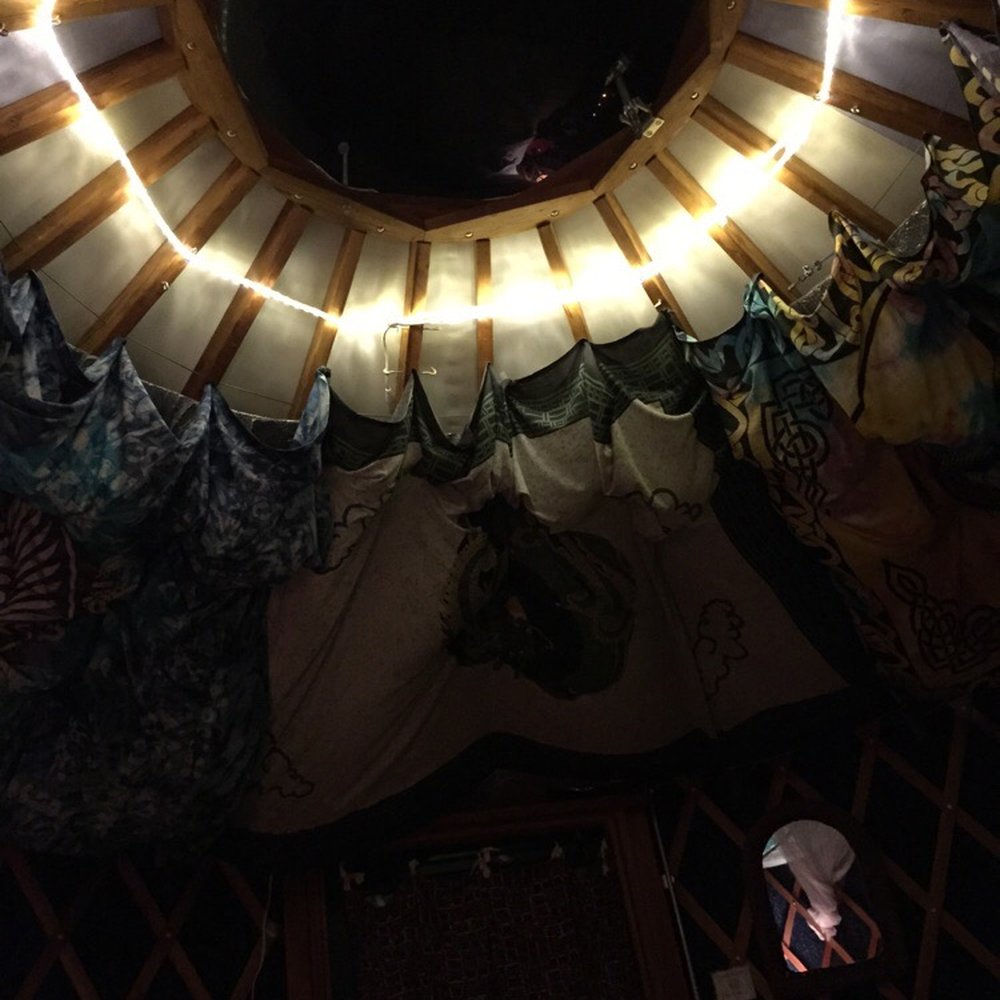 The yurt lighten up at night from the inside.