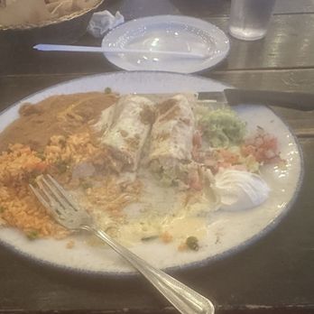 Candente - Museum District - Chicken tacos wrapped like enchiladas with queso sauce on top - Tex-Mex Near Me - Houston, Texas Candente - Museum District - Chicken tacos wrapped like enchiladas with queso sauce on top - Tex-Mex Near Me - Houston, Texas